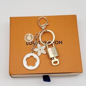 Authentic Louis Vuitton Gold Lock & Box w/ Unbranded Flower Bagcharm 122725